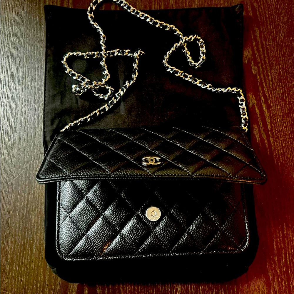 Chanel WOC brand new. Black caviar leather with silver detailing